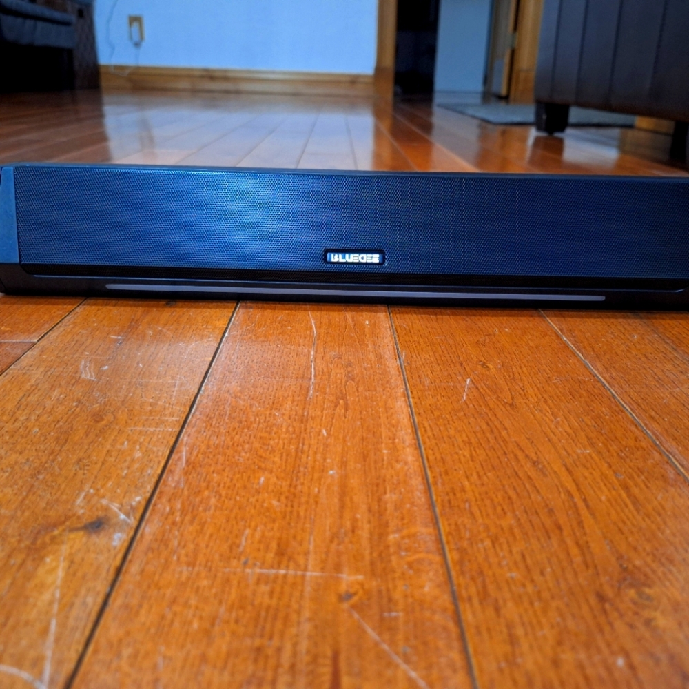 Navy Blue Portable Speaker with Sleek Design and High-Quality Sound